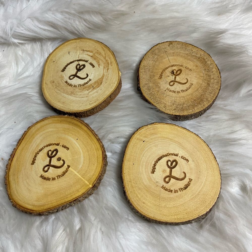 Lipper International Acacia Tree Barks set of four coasters .